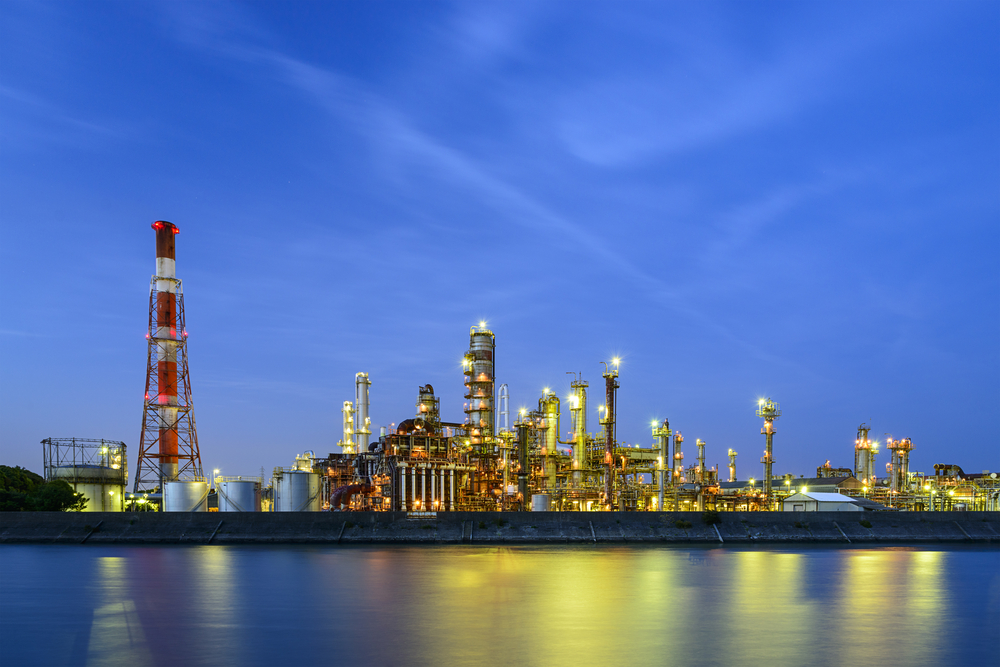 Oil refineries line a river in Yokkaichi, Japan. The city has been a center for the chemical industry since the 1930s.-1
